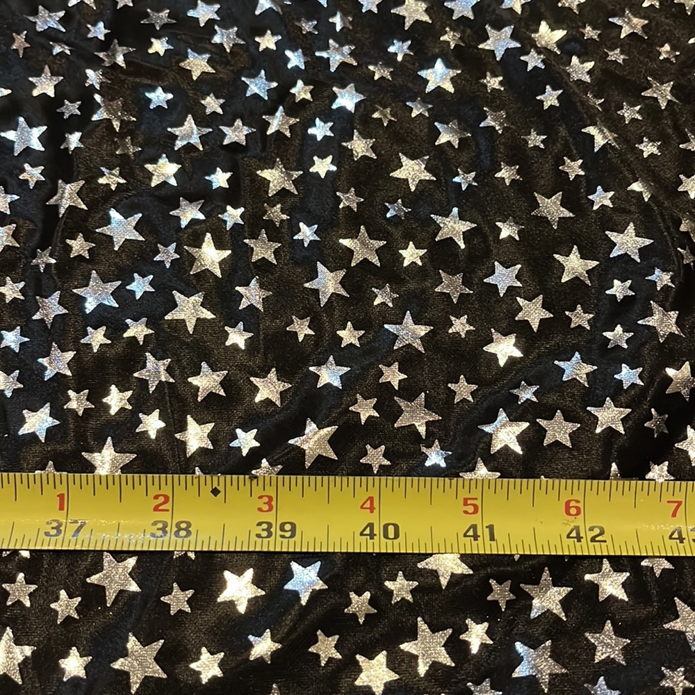 3.25 yards of black polyester with silver stars stretchy fabric